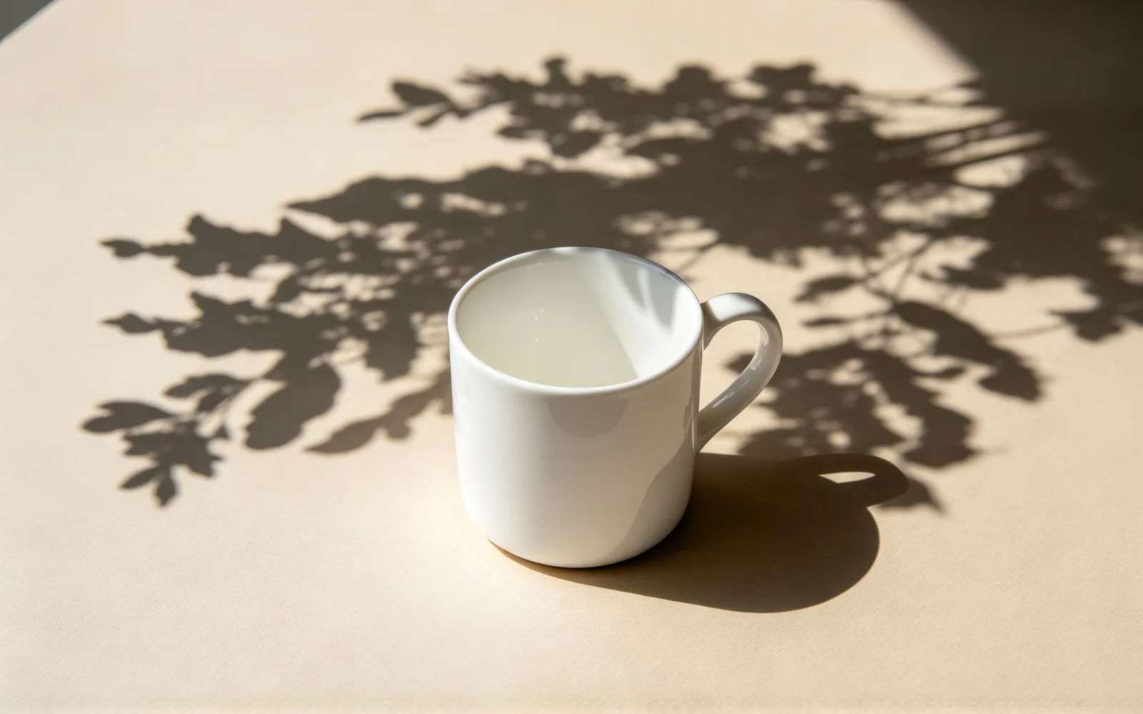 A hard shadow removed from a product on a tabletop — Before